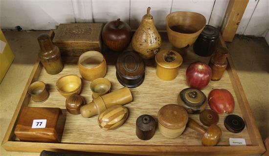 24 pieces of turned wood treen including a pear shaped burr wood tea caddy